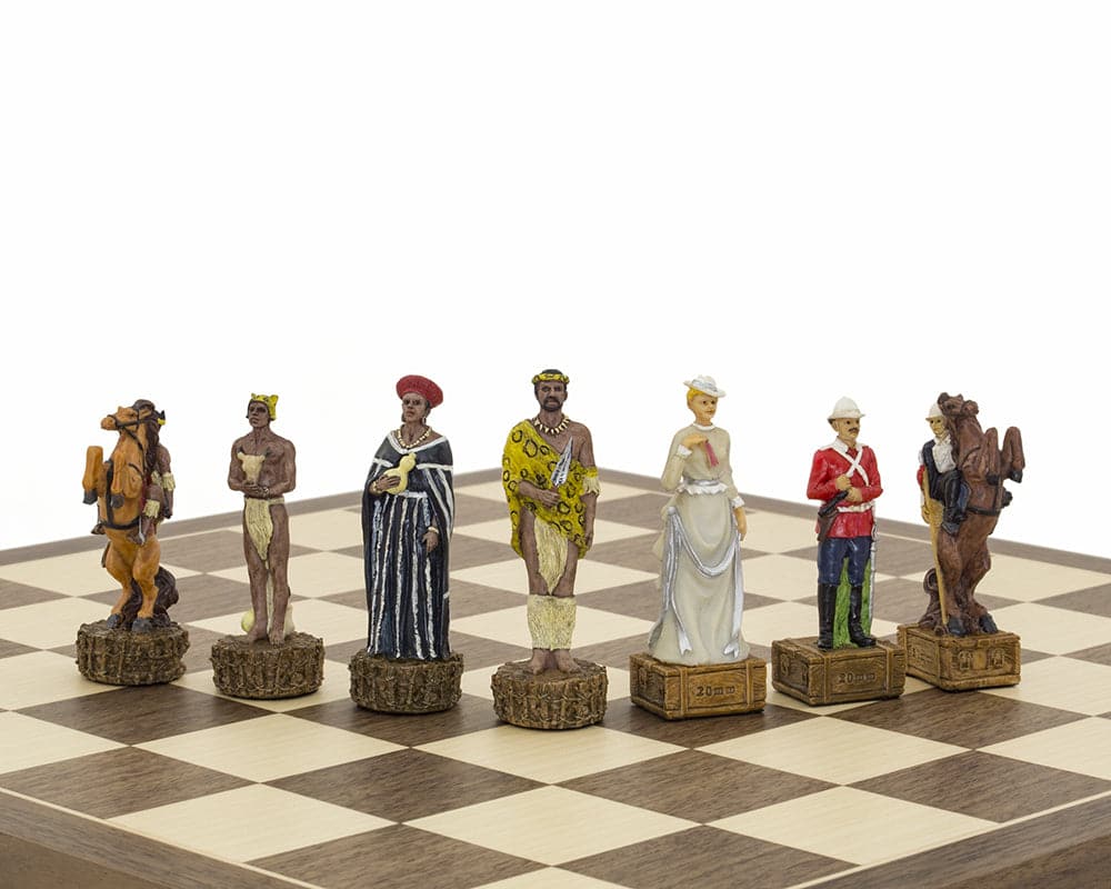 Hand-painted British vs Zulus themed chess pieces by Italafama displayed on a chessboard, featuring ornate and detailed designs.