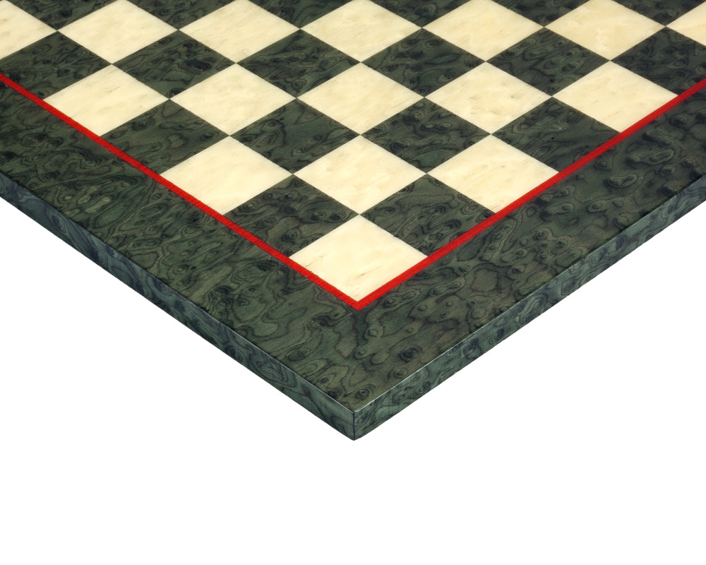 Close-up of a 16.75 inch olive green erable and elm wood chess board with high gloss lacquer finish featuring 1.55 inch playing squares.