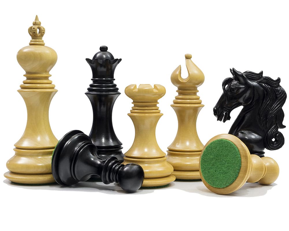 The Cavalry Series Chessmen Ebony 4.5" set with ornately carved pieces and imposing 4.5" king, featuring a handcrafted ebony knight.