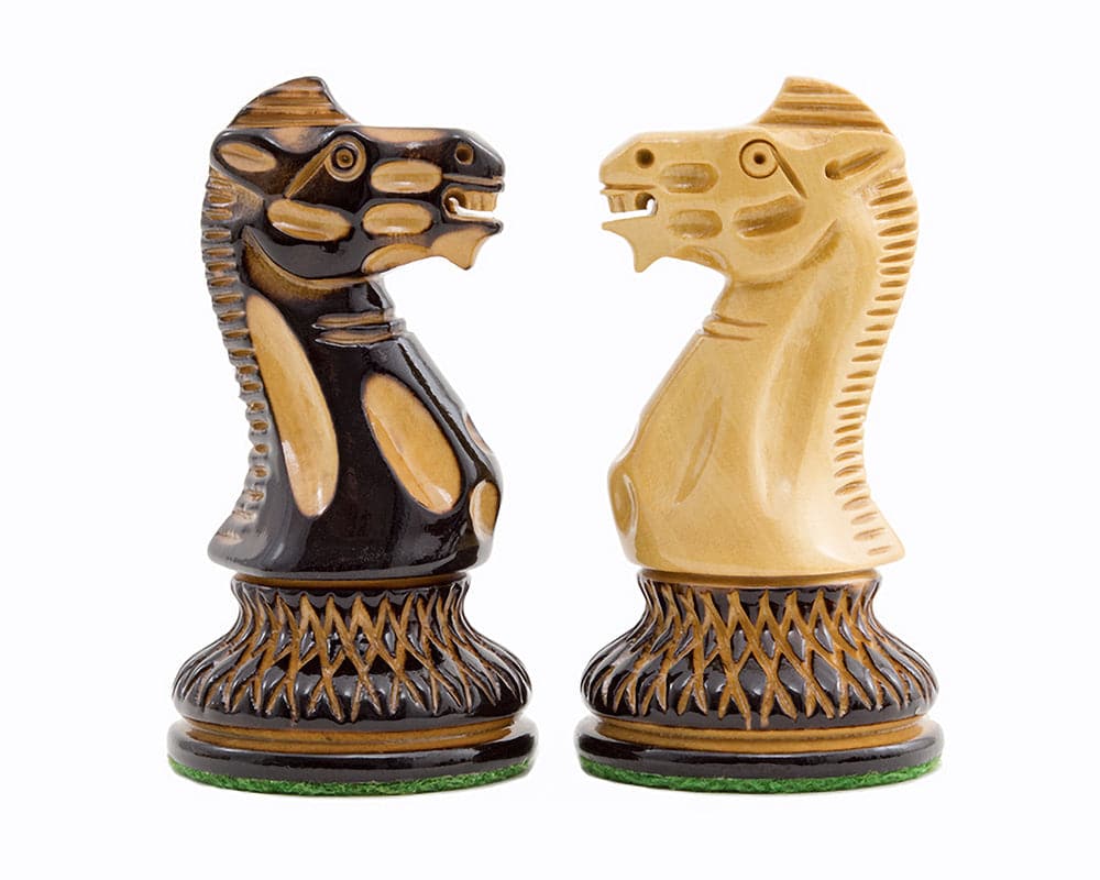 Burnt Parker Chessmen horse pieces, dark and golden tones, intricately carved on burnt Boxwood, 4-inch size, ideally suited for a 20-inch board.