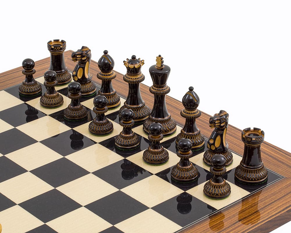 Burnt Parker Chessmen 4 inch Staunton style pieces on 20 inch chess board, showing intricate carving on burnt Boxwood and weighted for perfect balance.