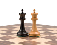 Ebony and walnut Staunton chess pieces on walnut and maple chessboard
