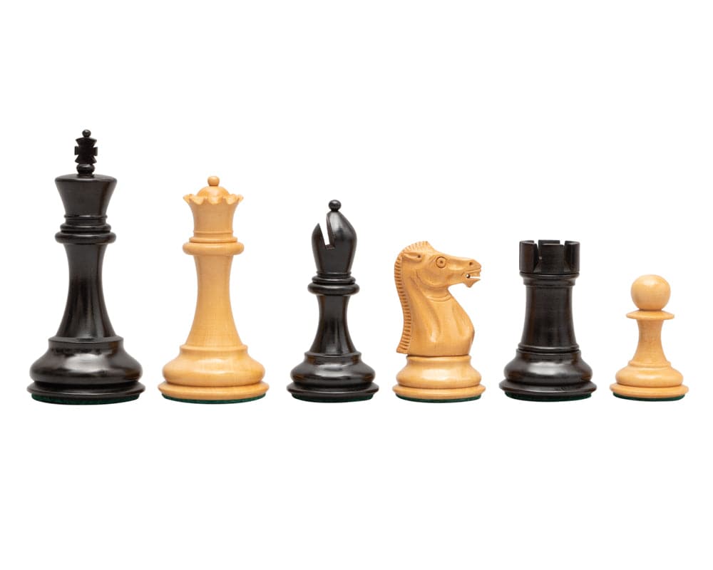 The Abingdon 3.5 inch Ebonised Chess Men, Staunton design, weighted and felted, black and natural wood pieces on white background.