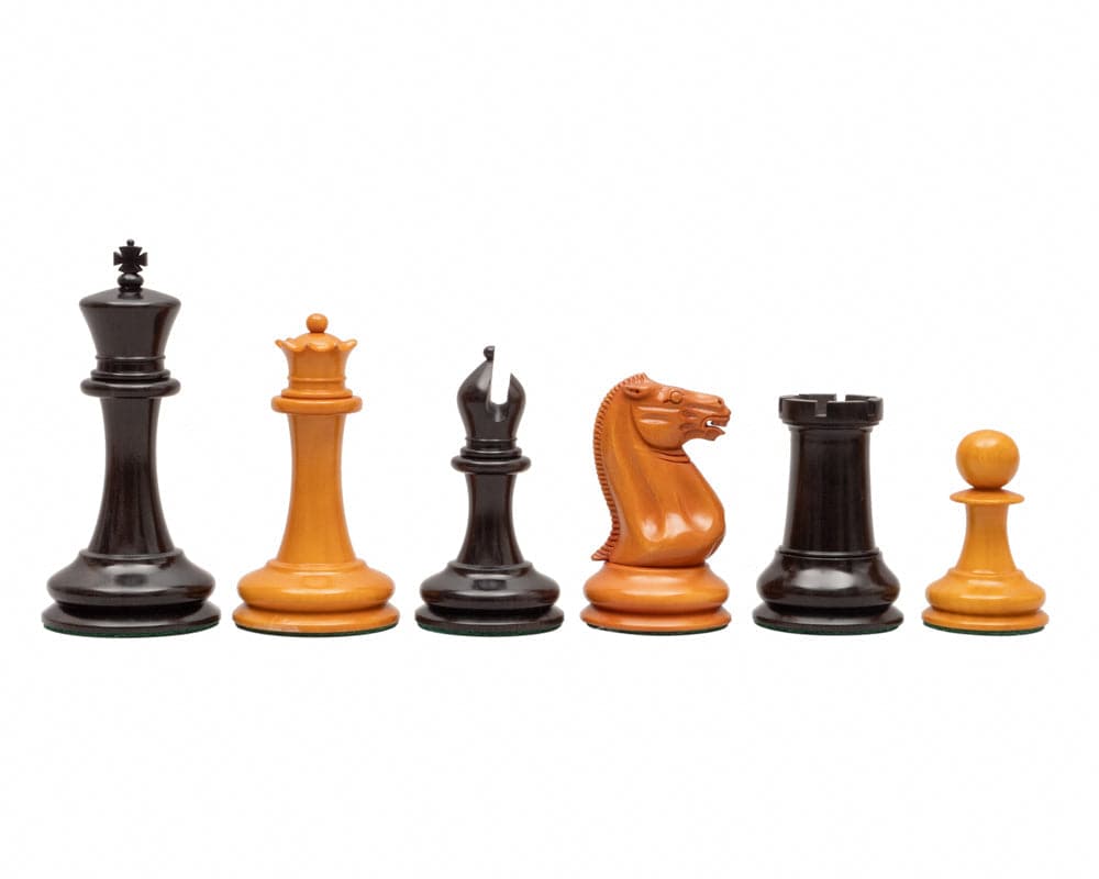 J J Cooke Edition Ebony and Antiqued Boxwood Chessmen, featuring intricately carved pieces in black and wood tones, 4.4 inches tall.