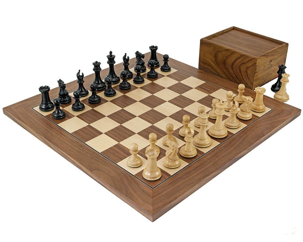 Sovereign Ebonised and Walnut Chess Set with Maple Board and Case displayed on a wooden surface.