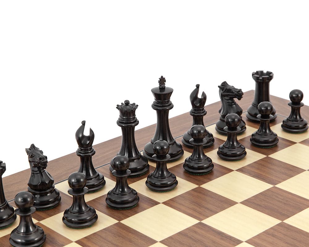 Ebonised Staunton chessmen on Walnut and Maple chess board showcasing the Sovereign series with detailed pieces.