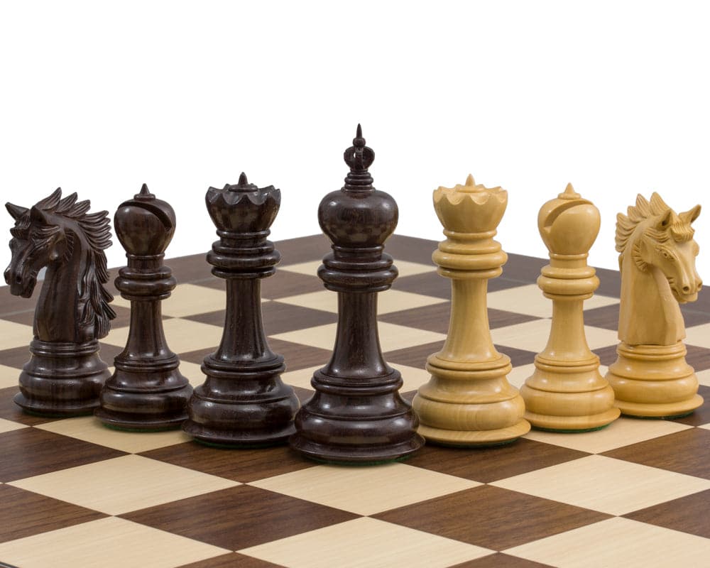 Hand-carved chess pieces on a 23.6 inch rosewood and boxwood chess board from The Dubliner Montgoy Luxury Grand Chess Set