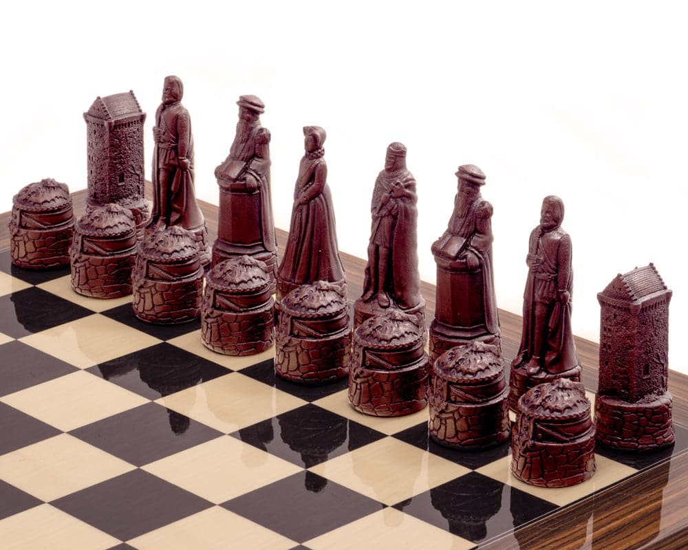 Stone crushed resin chess pieces on Black Anegre and Palisander chessboard, featuring historical figures in russet color.