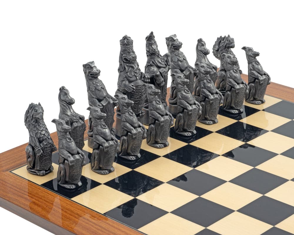 Royal Beasts Metal and Palisander Grand Chess Set on a checkered board