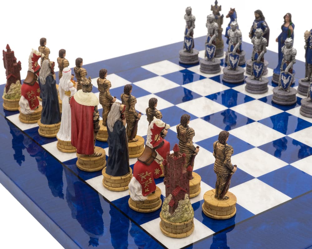 Hand-painted King Arthur luxury blue chess set with detailed resin pieces on a glossy blue erable & elm wooden board.