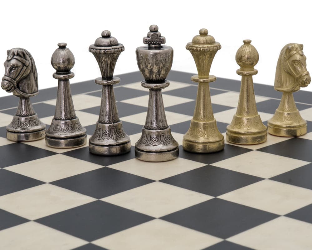 The Finnesburg and Black Classic Ornate Chess Set pieces on a chessboard