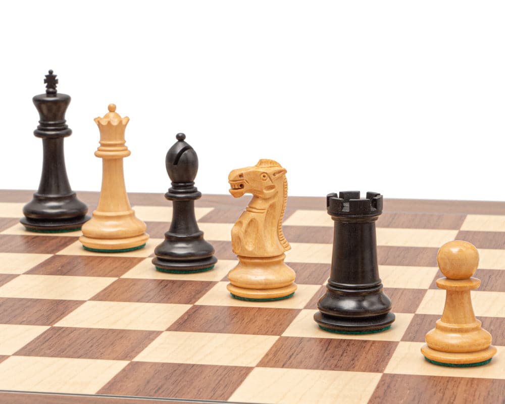 The Warwick Grand Black and Walnut Chess Set with traditional Staunton design pieces on a high-quality Walnut and Maple board with 1.75-inch squares