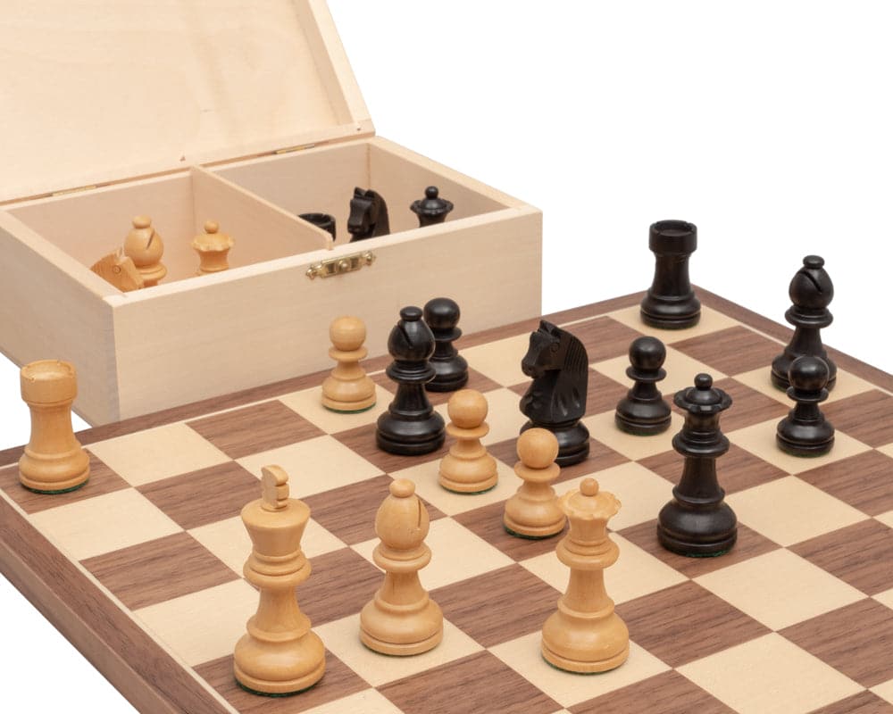 Traditional chess and draughts set with weighted Staunton chess pieces and draught counters, crafted from boxwood, on Walnut and Maple board