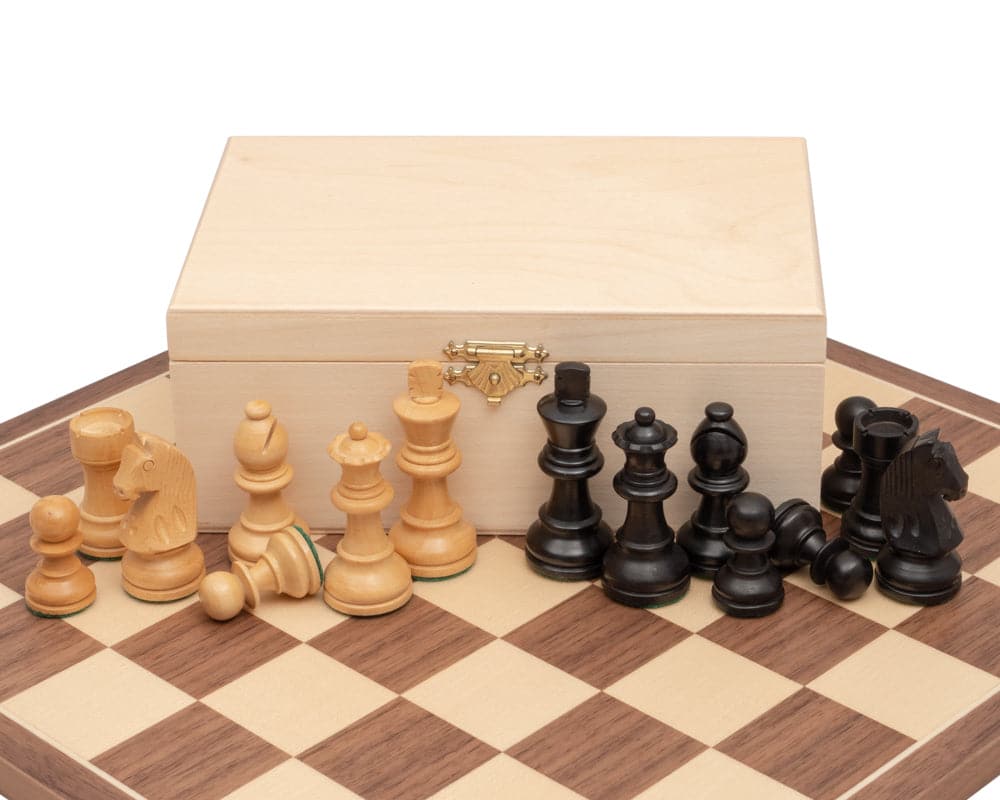 Traditional Chess and Draughts Set with Staunton design pieces on a Walnut and Maple board, featuring a solid sheesham box.