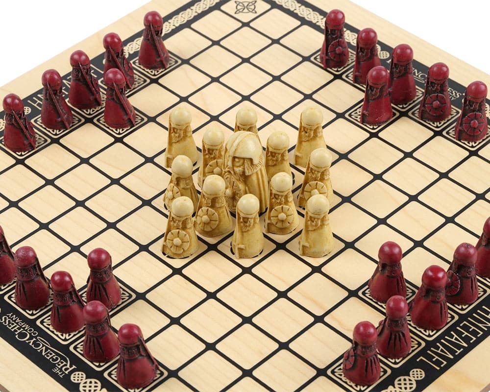 Hnefatafl - The Viking Game Cardinal Deluxe Edition with Isle of Lewis Chess Men on wooden board.