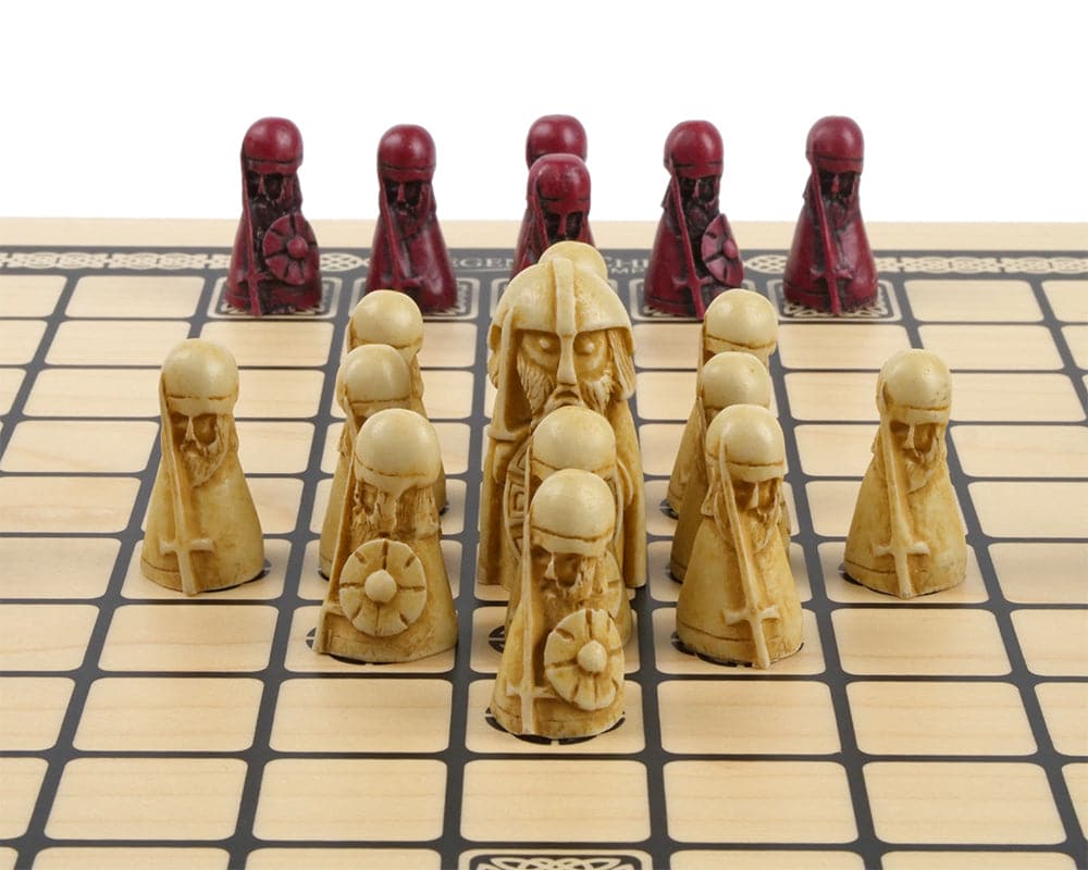 Hnefatafl Viking Game Cardinal Deluxe Edition on board with intricately designed Isle of Lewis chess men pieces.